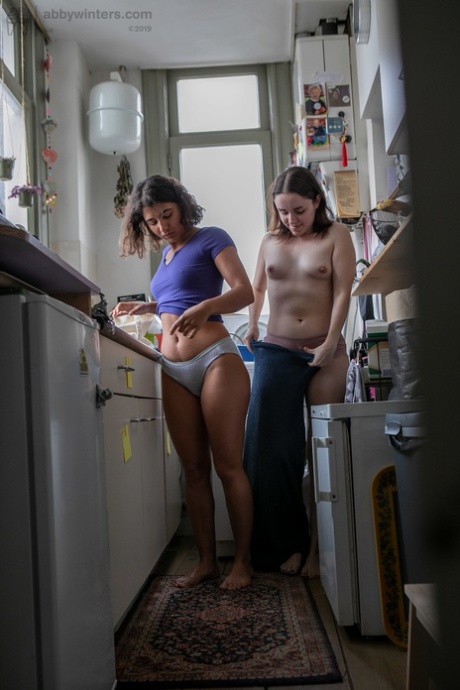 Petite babes with fat asses Sienna G & Tilly B dressing in the narrow kitchen