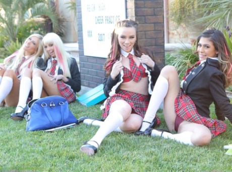 Busty blonde schoolgirl Tasha Reign and her friends strip and pose together