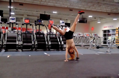 Naughty babe with big boobs Nala works out while naked at the gym