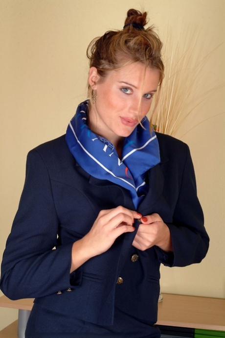 Sexy stewardess Angelina loses her uniform and spreads her hairy vagina