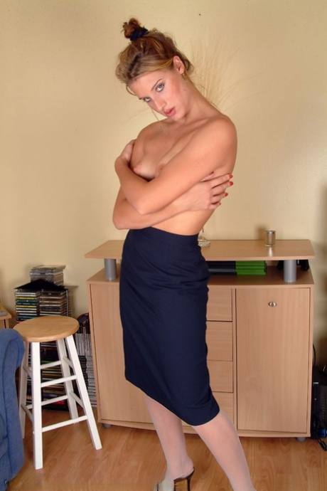 Sexy stewardess Angelina loses her uniform and spreads her hairy vagina