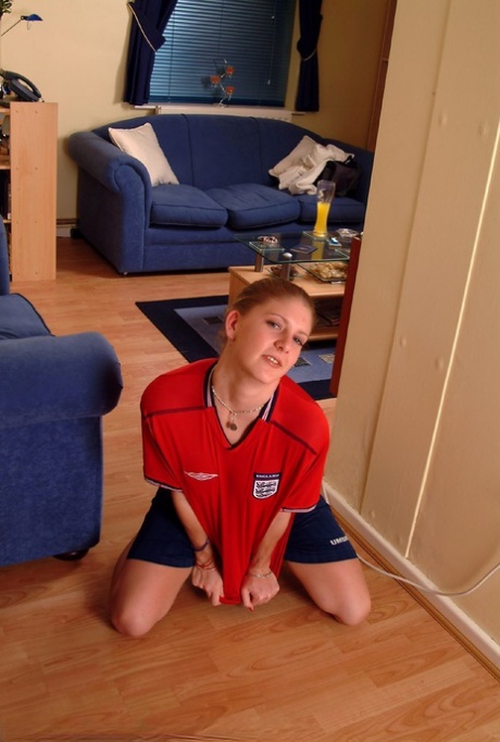 Soccer girl Kerry peels off her uniform & fingers her tight pussy up close