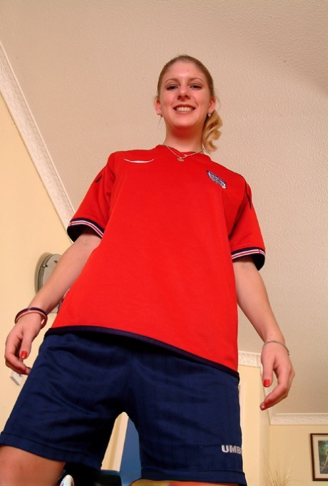 Soccer girl Kerry peels off her uniform & fingers her tight pussy up close