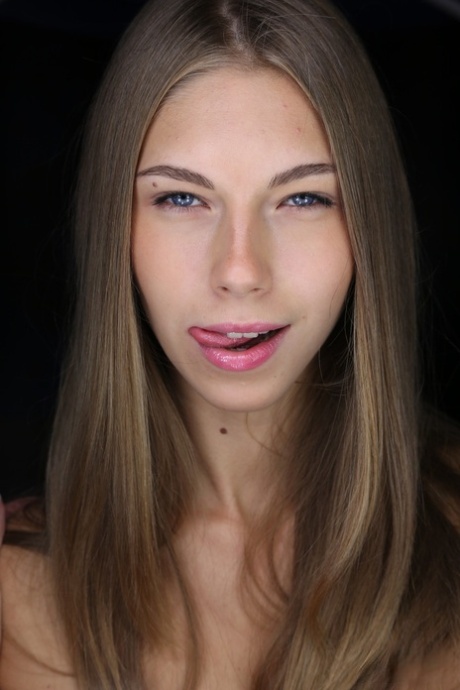 Teen with amazing eyes Abby licks her lips and spreads her fuckable twat