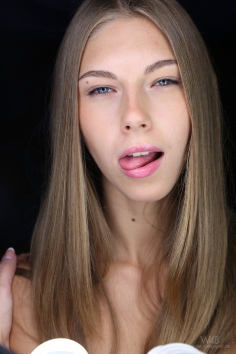 Teen with amazing eyes Abby licks her lips and spreads her fuckable twat