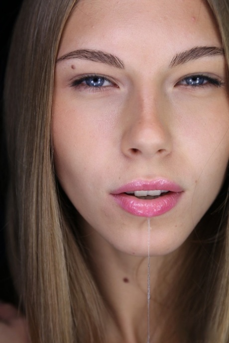 Teen with amazing eyes Abby licks her lips and spreads her fuckable twat