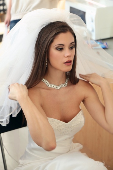 Slim teen Little Caprice poses in stockings & chocolate at a photo shoot