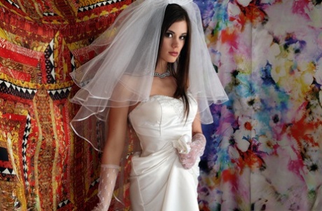 Slim teen Little Caprice poses in stockings & chocolate at a photo shoot