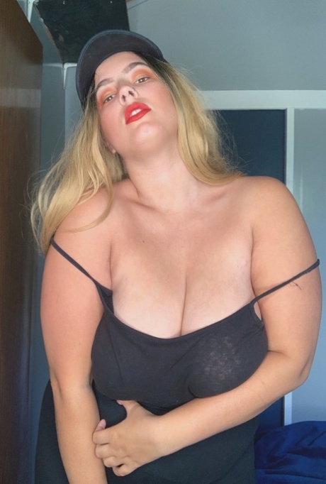 Chubby blonde babe Jordyn khaled shows her huge boobs and poses in nylons