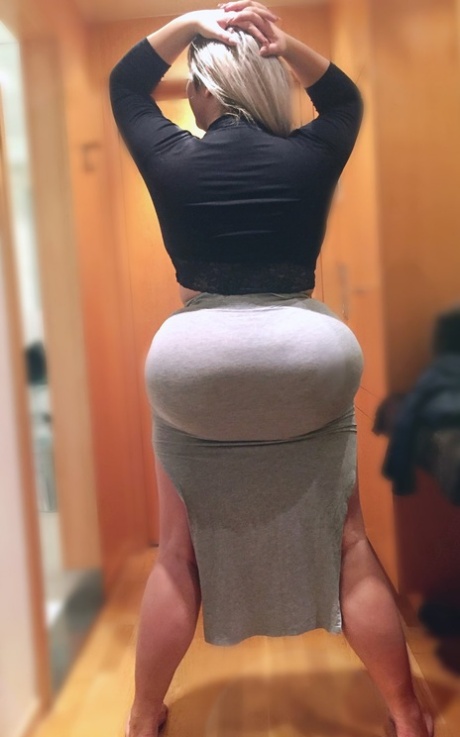 Blonde MILF Natasha Crown shows off her monster bubble booty in her sexy skirt