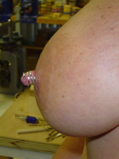 Mature wife Dee posing with nipple rings on her perfect natural boobs