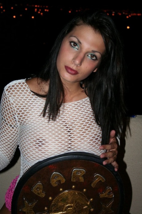 Amateur Korri smokes a cigarette & flaunts her big natural boobs on a terrace