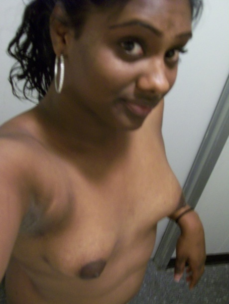 Ebony teen Paris takes selfies while showing her big ass & puffy nipples