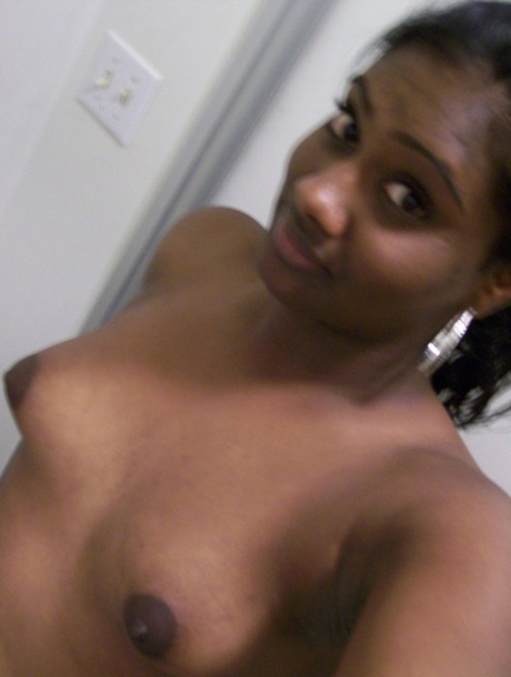 Ebony teen Paris takes selfies while showing her big ass & puffy nipples