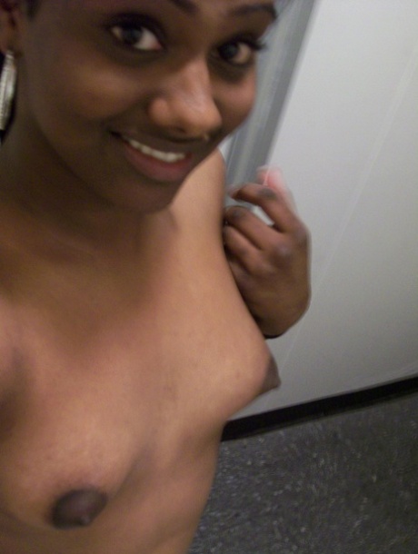 Ebony teen Paris takes selfies while showing her big ass & puffy nipples