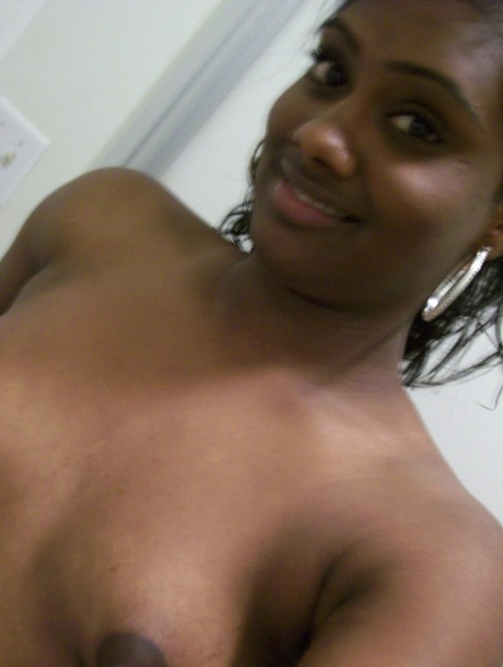 Ebony teen Paris takes selfies while showing her big ass & puffy nipples