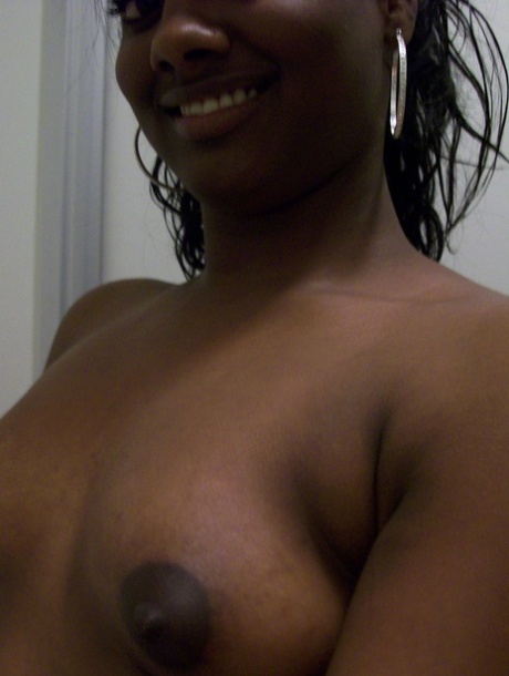 Ebony teen Paris takes selfies while showing her big ass & puffy nipples