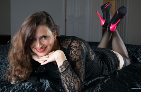 Breathtaking MILF Alice Cash poses in her sexy lace lingerie and heels