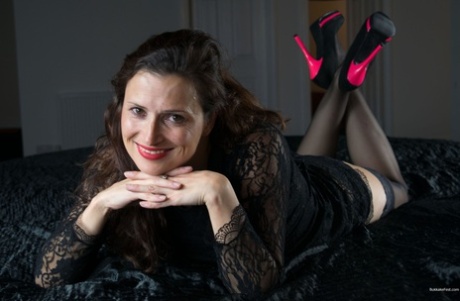 Breathtaking MILF Alice Cash poses in her sexy lace lingerie and heels