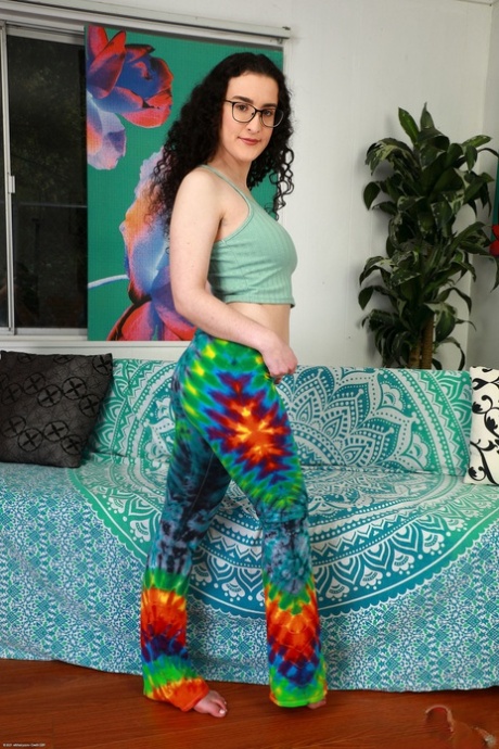 Sexy brunette Lyra Lockhart shows off her big ass & spreads her hairy pussy