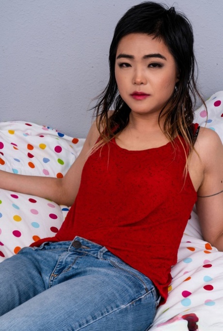 Exotic Asian teen Roxane Lee shows her asshole up close before masturbating