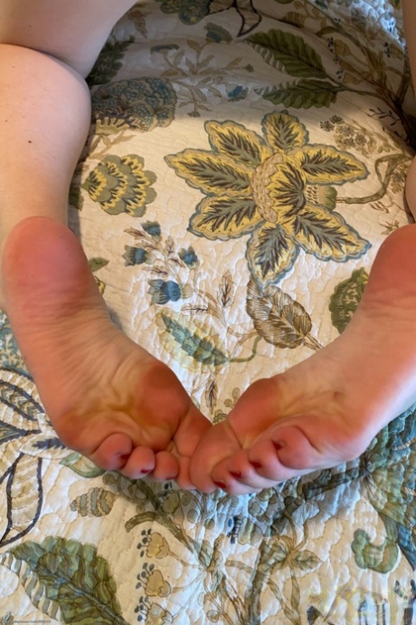 Shameless cutie Paris White showing her feet and delicious holes up close