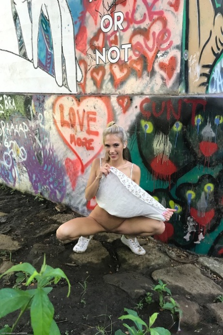 Petite teen Sky Pierce exposing her freshly shaved holes up close