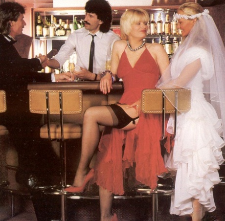 Kinky bride and a hot blonde swap partners at a bar in vintage foursome action