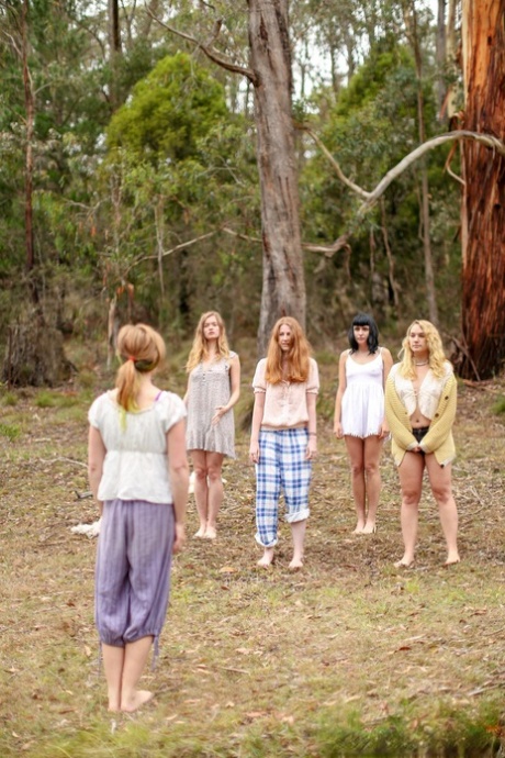 Gorgeous Australian girls practicing yoga in their hot outfits in nature