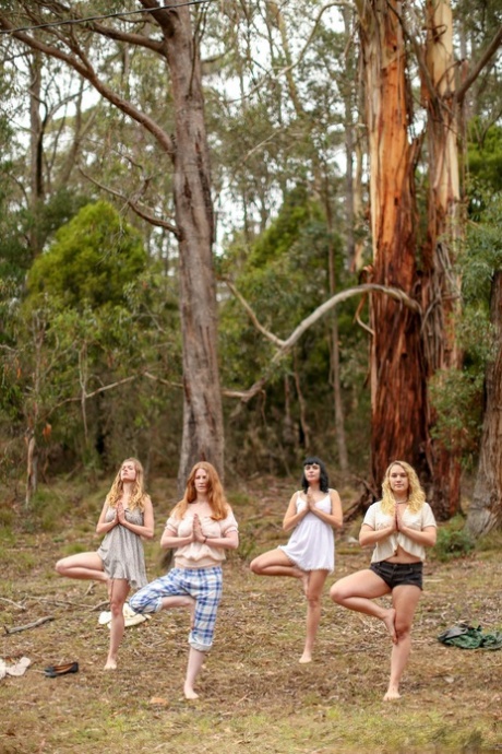 Gorgeous Australian girls practicing yoga in their hot outfits in nature
