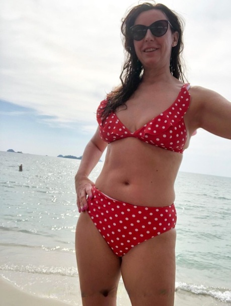 Sexy British lady Lara shows her big tits & ass in her bikini compilation