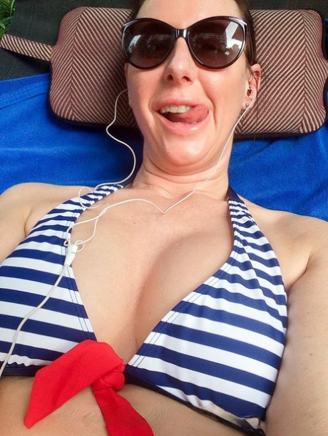 Sexy British lady Lara shows her big tits & ass in her bikini compilation