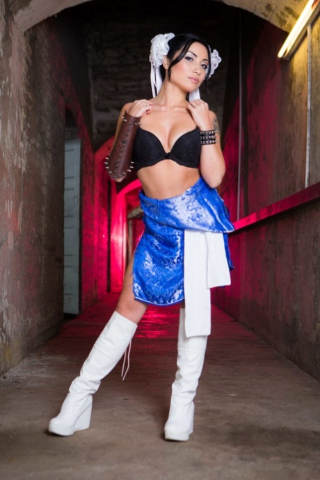 Petite South Korean teen Rina Ellis loses her costume and poses in her boots