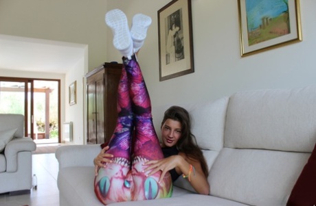 Skinny brunette Melena Tara shows off her big booty in her sexy leggings