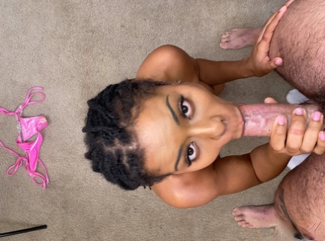 Curvy ebony Kira Noir exposes her firm fake tits before a blowjob & big facial