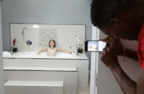 Amateur doll Tristan Summers blows & fucks a huge black rod in the bathtub