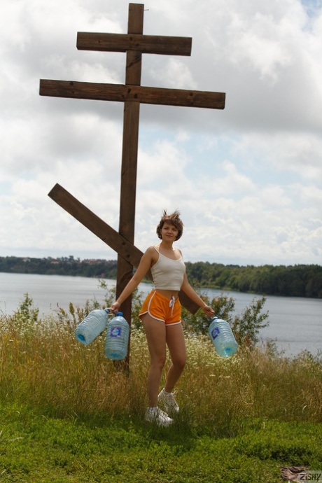 Little Russian babe Victoria Minina poses in her hot booty shorts & shirt