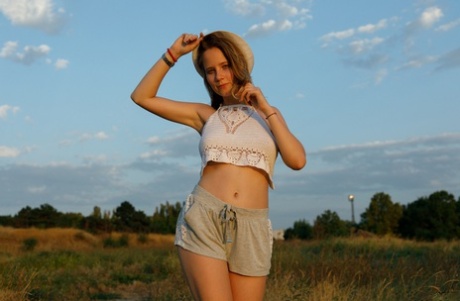 Cute amateur teen Diana Sedova exposes her wonderful breasts and body