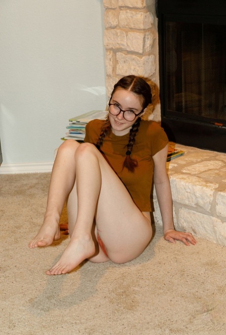 Teenage babe Hazel Moore shows off her curves and plays with a toy