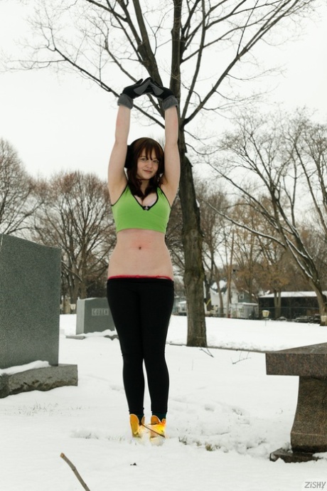 Amateur babe Daisy Wensday displays her amazing juggs and big ass in the snow