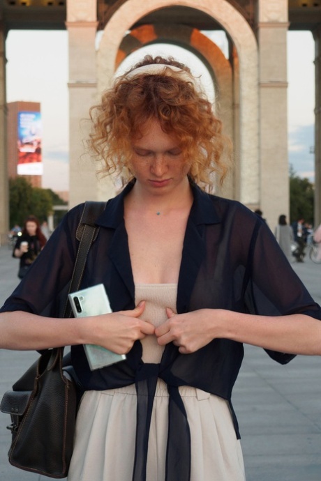 Ginger Arina Bik flashes her boobs in public & poses in her lingerie at home