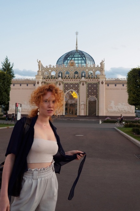 Ginger Arina Bik flashes her boobs in public & poses in her lingerie at home