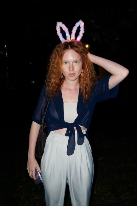 Ginger Arina Bik flashes her boobs in public & poses in her lingerie at home