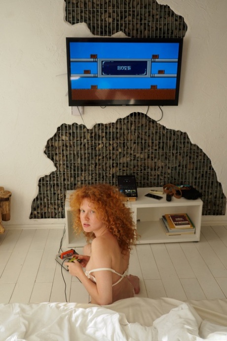 Ginger Arina Bik flashes her boobs in public & poses in her lingerie at home