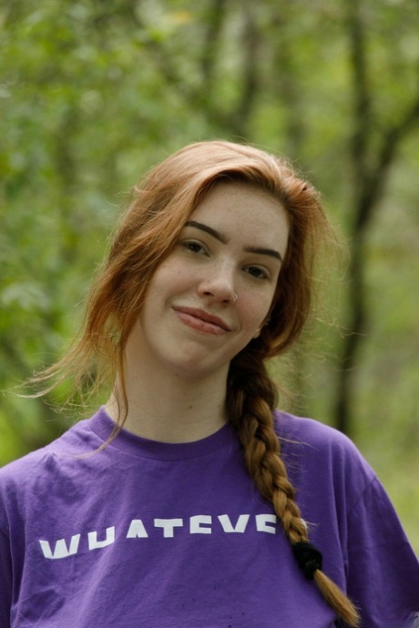 Redheaded babe Nala Brooks flashing her phenomenal big tits in public
