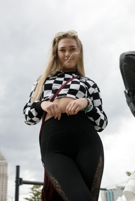 Cute amateur babe Stella Garmen flashes her booty in hot panties in public