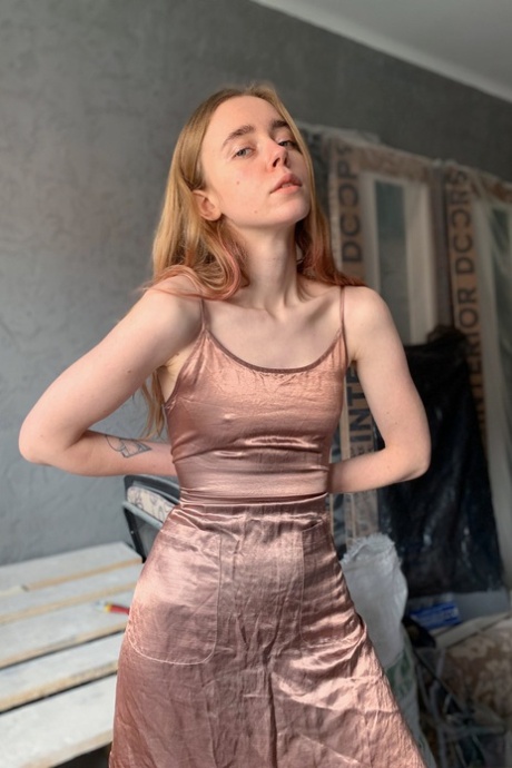 Naughty amateur Belarusian babe poses and strips during quarantine