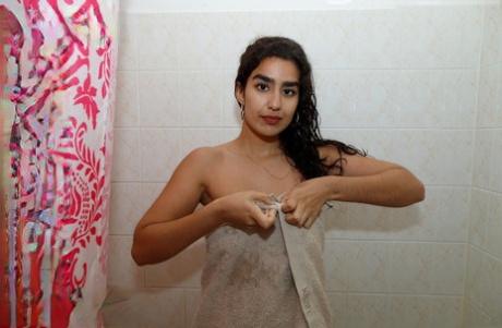 Hot Pakistani babe Luna Silver strips her sportswear and takes a bath