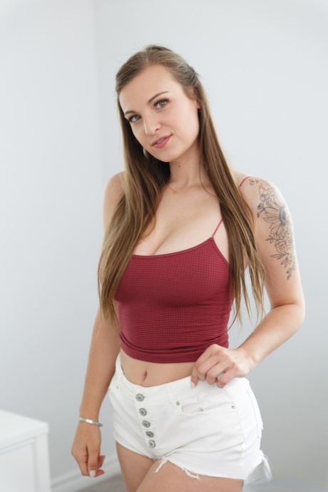 All-natural babe Kenzie Love strips off her hot top & shows her nice big tits