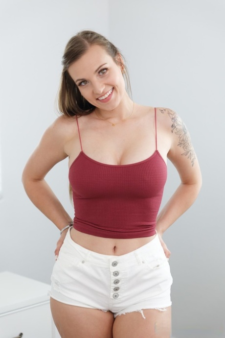 All-natural babe Kenzie Love strips off her hot top & shows her nice big tits